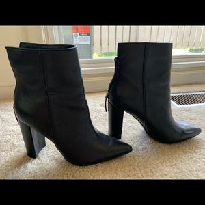 Black Steve Madden Pointed Toe Booties.